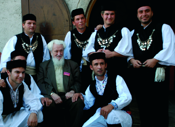 Founder and long-time director of the Strakonice International Bagpipes Festival Josef Rezny sits for a photograph with friends from Turkey.