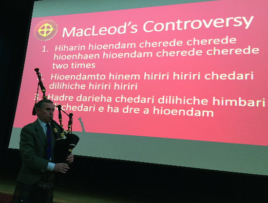 Jack Taylor playing MacLeod’s Controvosy with the chant in Gaelic on the projector behind him. Believe it or not, we all followed the words in his music
