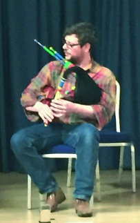 Donald Lindsay playing his own 3D printed smallpipes.